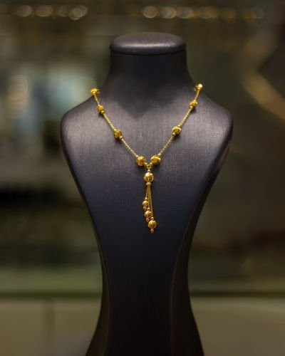 Gold tassel necklace