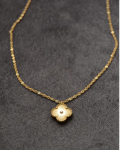 Quatrefoil gold pendant