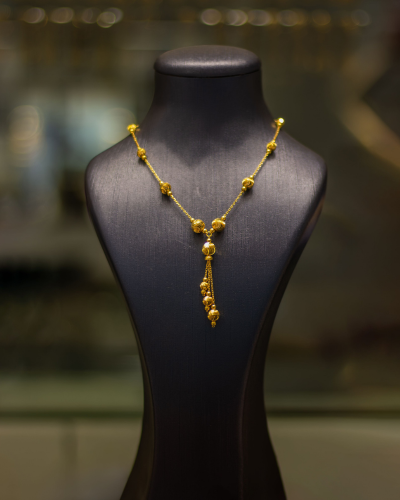 Gold tassel necklace